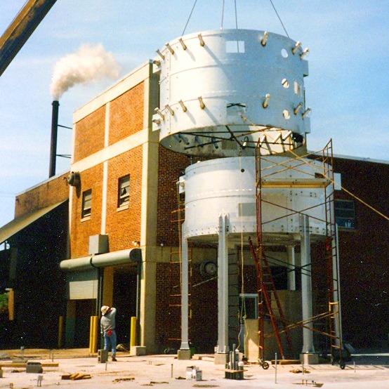 Cargill Structural Engineering of Silo next to a brick building.